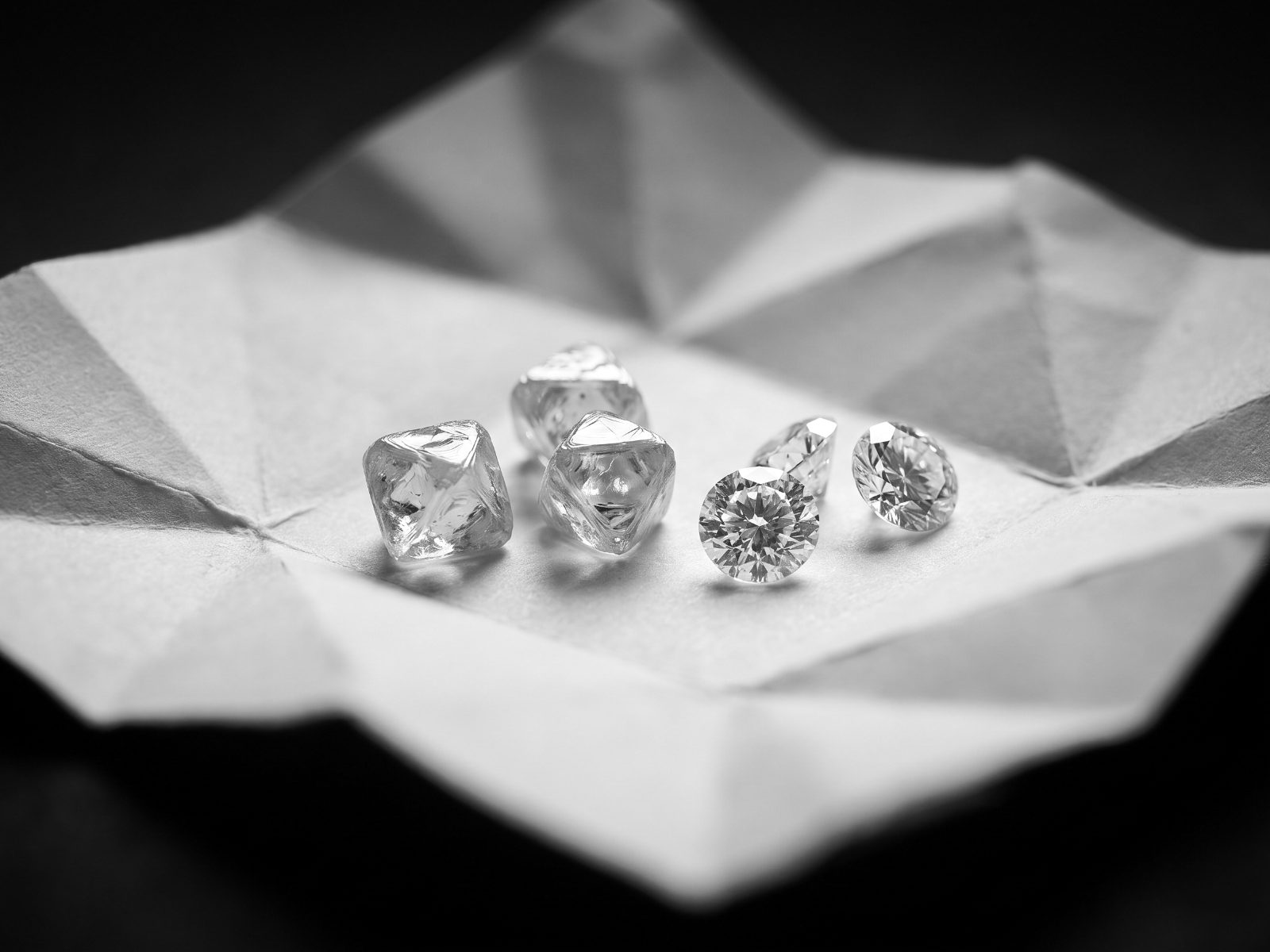 Natural diamonds being sorted for sourcing